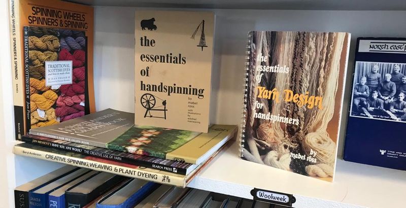 A shelf of books for Shetland Wool Week